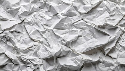 crumpled white paper with many strong creases