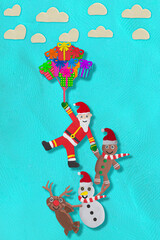Santa claus , ginger bread , snowman , reindeer flying with giftbox balloon on blue sky