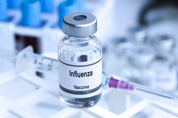 Influenza vaccine in a vial, immunization and treatment of infection