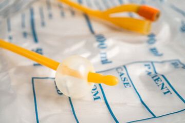 Foley urinary catheter with urine bag for disability or patient in hospital.