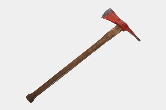 Red wooden fire axe, most common firefighting tool, with copy space. Front view of pick head fire striking ax, isolated on white studio background. Concept of firefighting tools, fire equipment.