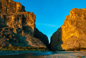 A view of Santa Elena Canyon in Big Bend National Park. Cliffs rise steeply