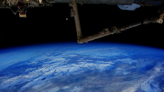 Time-lapse of a moonrise over planet Earth. Day to night scene. Elements furnished by NASA