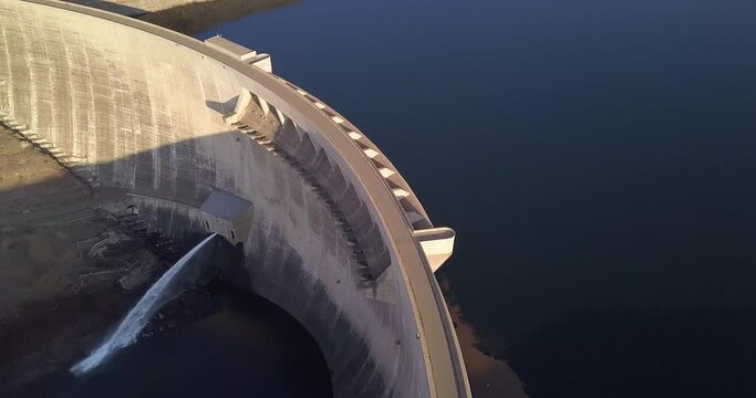 Drone, industry and dam water in a natural environment for sustainability in an eco friendly location. Liquid, engineering or hydro design of lake architecture in nature for green conservation