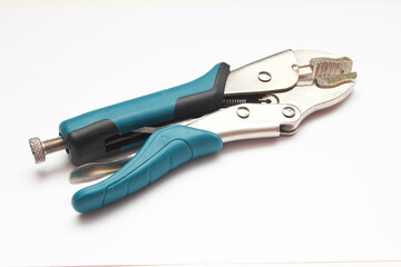 Tools for pliers on a white background, close-up.