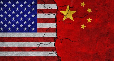 USA and China flag together on a cracked wall. China and United States of America diplomatic relations
