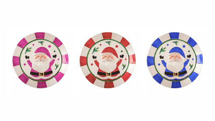 Group of three colorful Santa Claus plates, isolated on white background.
