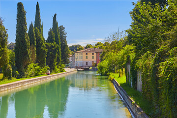 Fototapeta na wymiar Beautiful view of Monzambano and the river Minico. Province of Brescia, Italy.