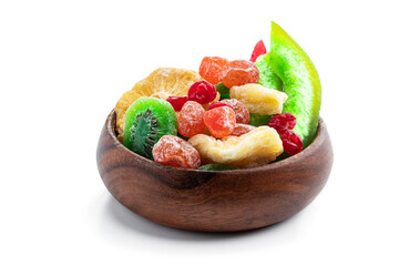 Candied fruits in wooden bowl isolated on white