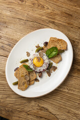 Fresh Tatar on a plate. Close-up