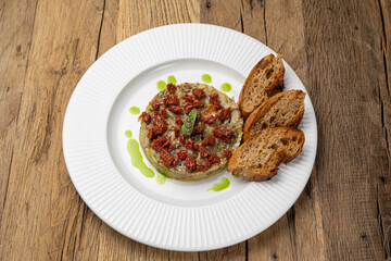 Fresh Tatar on a plate. Close-up