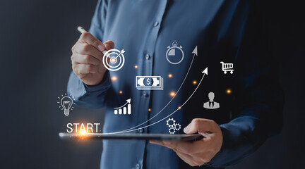 Startup concept with icon business and network connection on modern virtual interface from digital tablet. man touching on tablet.