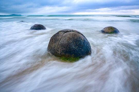 Long exposure of the Moeraki Boulders along Koekohe Beach on the South Island of New Zealand; Hampden, North Otago, New Zealand