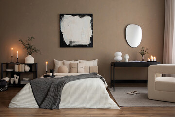Creative composition of warm bedroom interior with mock up poster frame, cozy bed, gray bedding,...