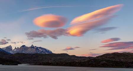Sunrise from Lago Grey with lenticular clouds in Torres del Paine National Park; Patagonia, Chile