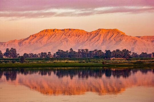 Looking west towards the Valley of the Kings at sunrise; Luxor, Egypt
