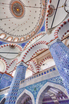 Close-up interior of the Rustem Pasha Mosque with its blue and white Iznik tiles and domed ceiling; Istanbul, Turkey