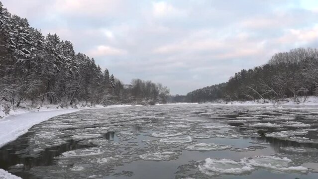 Floes in river Neris in Vilnius, cold winter evening