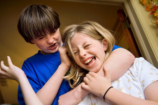 Two siblings in a physical fight at home; Lincoln, Nebraska, United States of America