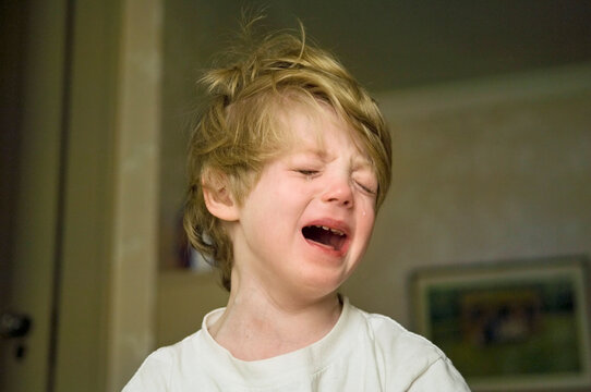 Portrait of a 4-year-old boy crying at his home; Lincoln, Nebraska, United States of America