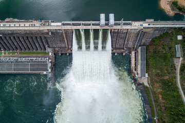 Aerial view of water discharge at hydroelectric power plant