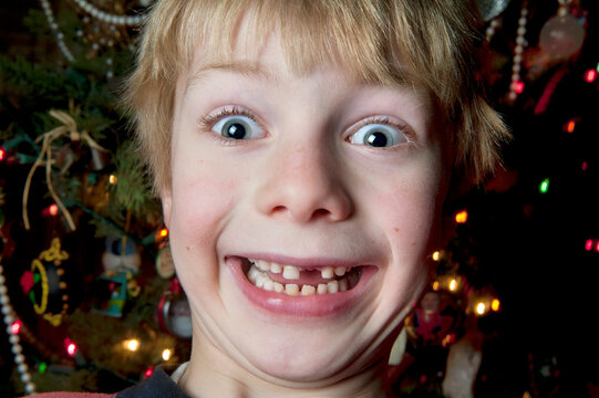 Young boy is excited at Christmas time; Lincoln, Nebraska, United States of America