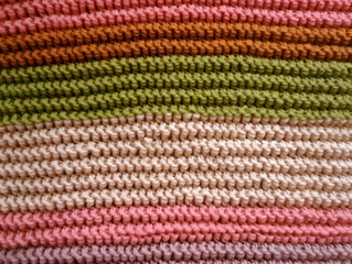 Knitted wool texture round shape background for Christmas. Close up of knitting wool texture.