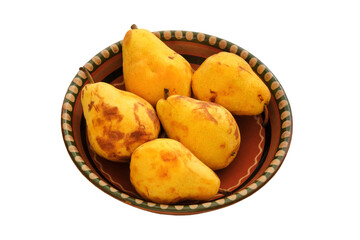 Pears in a clay beige plate. Farm pears in rustic bowl. Isolate on a white background. Harvest.