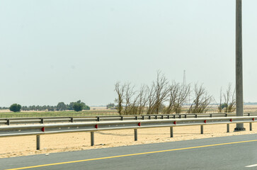Galvanised steel crash barriers on a highway