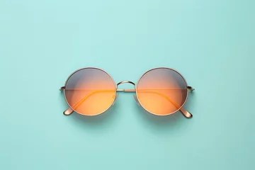 Zelfklevend Fotobehang a pair of round sunglasses © Ana