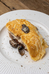 Delicious breakfast - Scrambled eggs with chicken, mushrooms and cheese