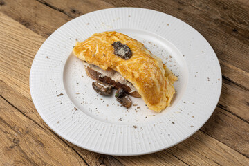 Delicious breakfast - Scrambled eggs with chicken, mushrooms and cheese