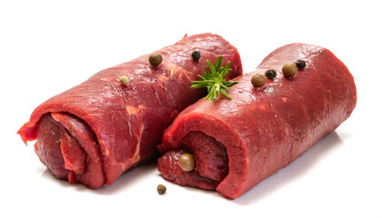 Raw beef roulades isolated on white background, cut out