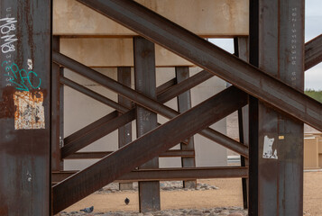abstract view of steel girders under railway bridge