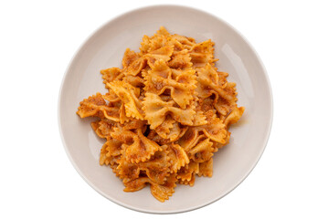 Farfalle pasta with tomato and chili and garlic sauce in white plate isolated