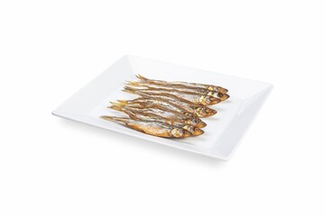 Smoked fish on a white plate from a fish shop
