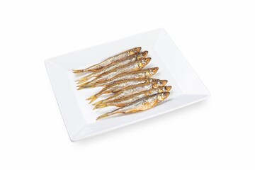 Smoked fish on a white plate from a fish shop
