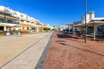 The picturesque seaside, whitewashed fishing village of Carvoeiro Portugal, along the Algarve...