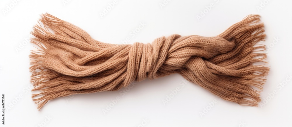 Poster handcrafted winter scarf against white backdrop copy space image place for adding text or design