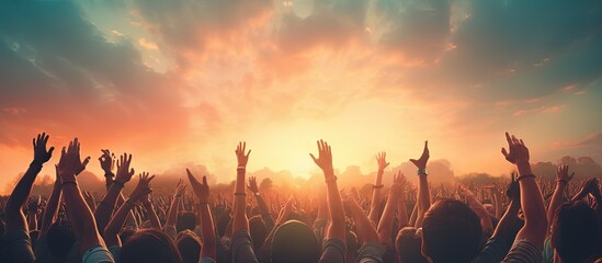Outstretched arms in a music festival crowd Copy space image Place for adding text or design - obrazy, fototapety, plakaty