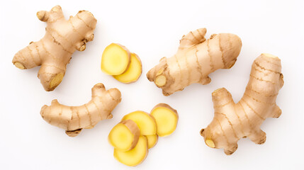 A spread of recently-sliced ginger root on a white background is depicted in this flatlay.