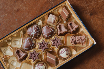 box of delicate chocolates bonbon flatlay