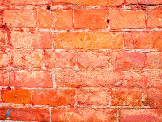 colored brick wall made of old bricks 