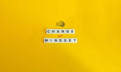 Fotobehang Change Your Mindset Phrase and Concept Image. Shift Your Perspective, Embracing a New Belief. Block Letter Tiles on Yellow Background. Minimalist Aesthetics. © photoopus