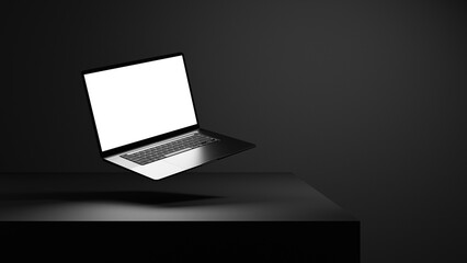 Laptop mock up with white empty blank screen on the black background with black dark wall and black...