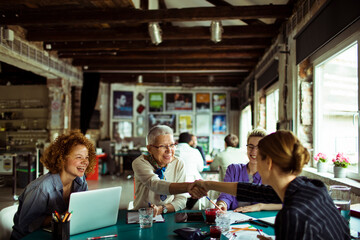 Creative Female Team Meeting in Modern Office Space