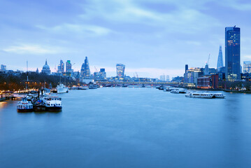 UK, London, skyline with River Thames at dawn