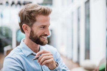 Portrait of smiling businessman