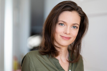 Portrait of smiling woman with brown hair