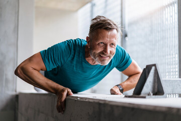 Sporty man making pushups